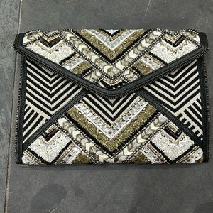 Rebecca Minkoff clutch bag. Black with silver and gold embellishments/beading